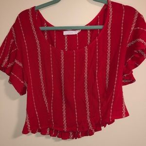 Adorable red blouse with white stitched embroidery